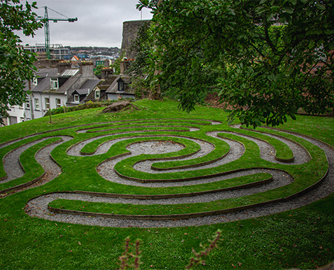 Labyrinth on a hill overlooking a small town
